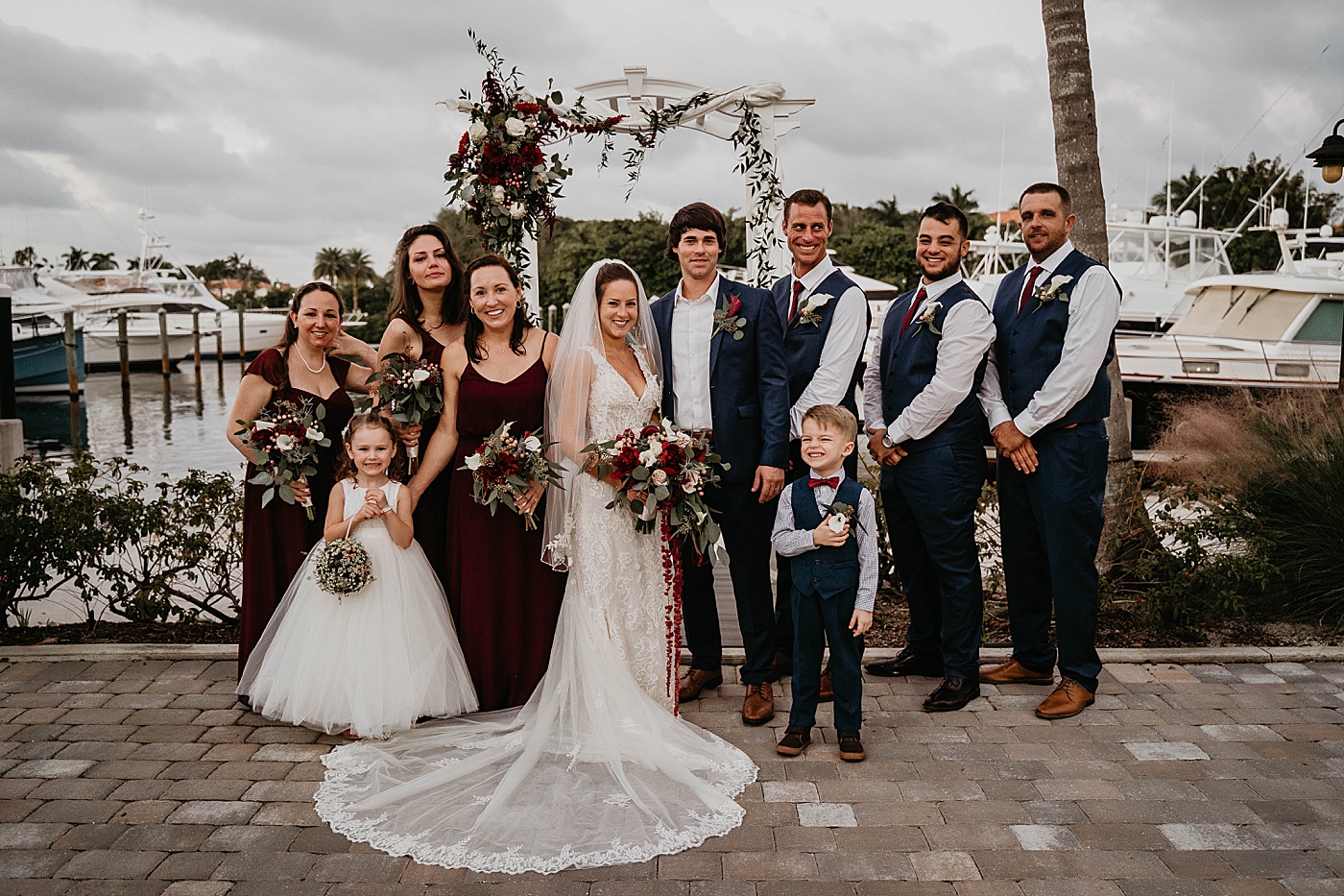Wedding party and Bride and Groom portrait Out of the Blue Celebrations Wedding Photography captured by South Florida Wedding Photographer Krystal Capone Photography 