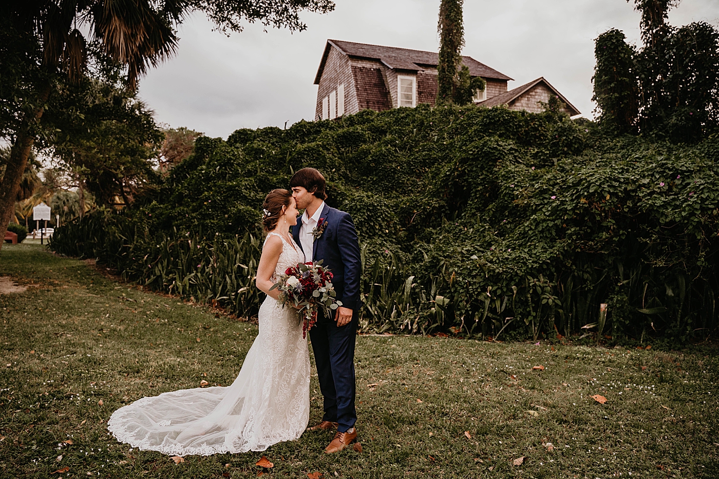Groom kissing Brides forehead Out of the Blue Celebrations Wedding Photography captured by South Florida Wedding Photographer Krystal Capone Photography 