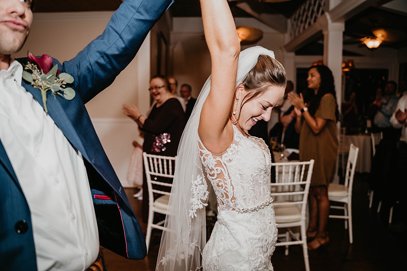 Bride closeup of entrance into Reception Out of the Blue Celebrations Wedding Photography captured by South Florida Wedding Photographer Krystal Capone Photography 