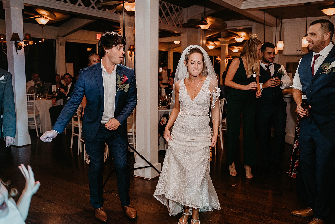Bride and Groom having fun dancing at Reception Out of the Blue Celebrations Wedding Photography captured by South Florida Wedding Photographer Krystal Capone Photography 