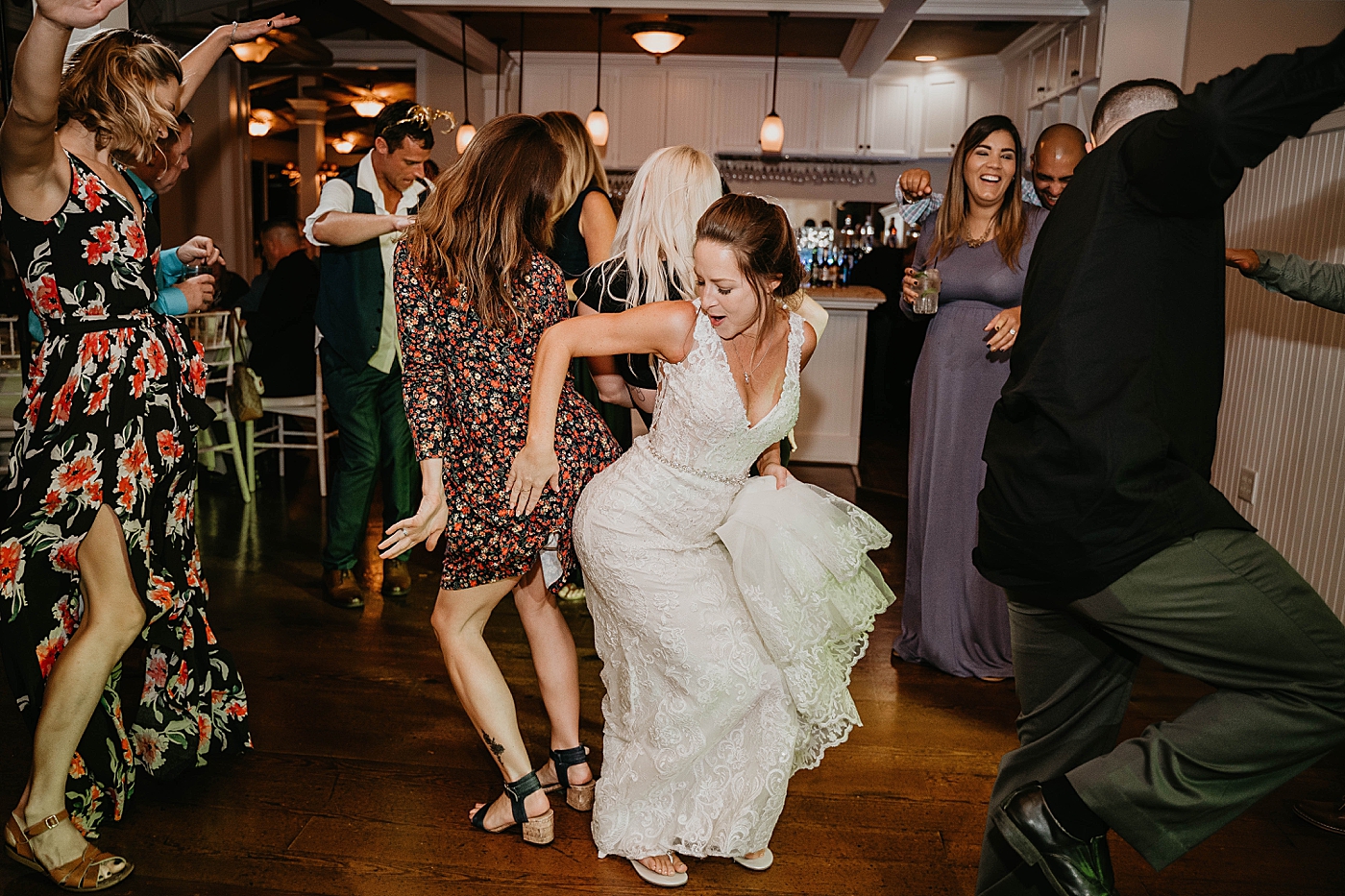 Bride dancing at reception Out of the Blue Celebrations Wedding Photography captured by South Florida Wedding Photographer Krystal Capone Photography 
