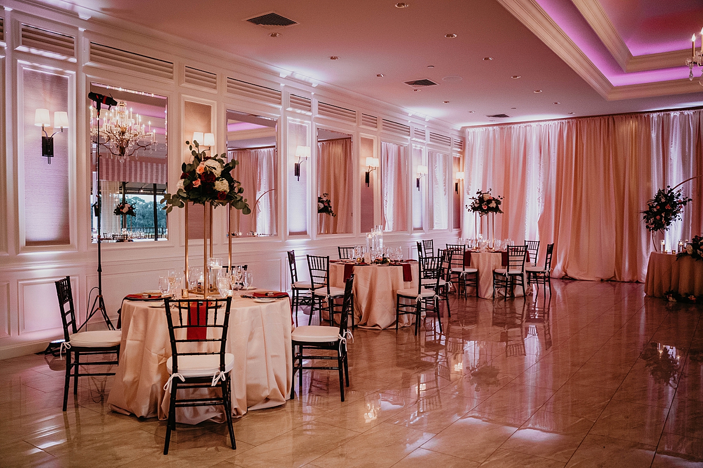 Detail shot of reception tables with flower centerpiece Breakers West Wedding Photography captured by South Florida Wedding Photographer Krystal Capone Photography 