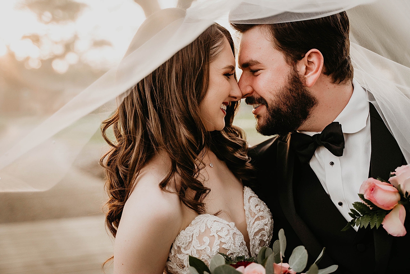 Bride and Groom under the veil shot Breakers West Wedding Photography captured by South Florida Wedding Photographer Krystal Capone Photography 