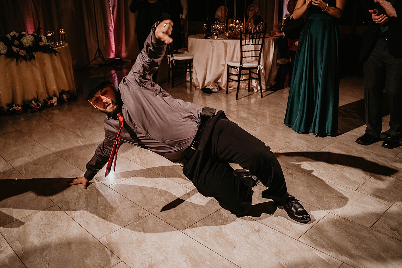 Break dancing at reception Breakers West Wedding Photography captured by South Florida Wedding Photographer Krystal Capone Photography 