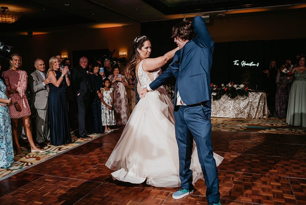 Bride and Groom having fun first dance Jupiter Beach Resort Wedding Photography captured by South Florida Wedding Photographer Krystal Capone Photography 