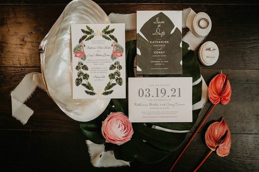 Detail shot of invitation wedding bands and engagement ring Pelican Club Wedding Photography captured by South Florida Wedding Photographer Krystal Capone Photography 