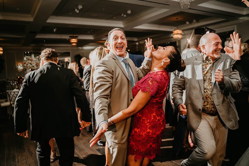 Dancing Reception Pelican Club Wedding Photography captured by South Florida Wedding Photographer Krystal Capone Photography