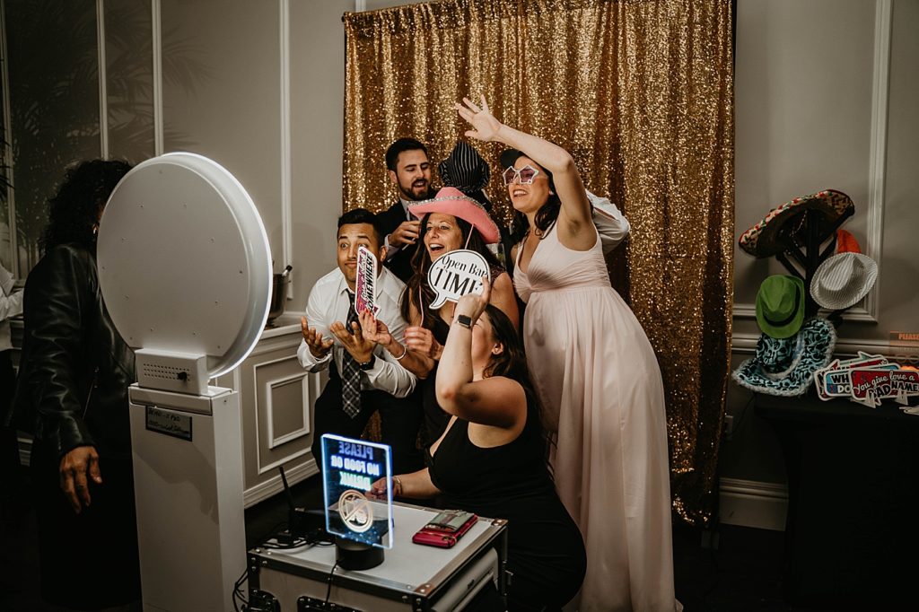 Photobooth picture fun Pelican Club Wedding Photography captured by South Florida Wedding Photographer Krystal Capone Photography