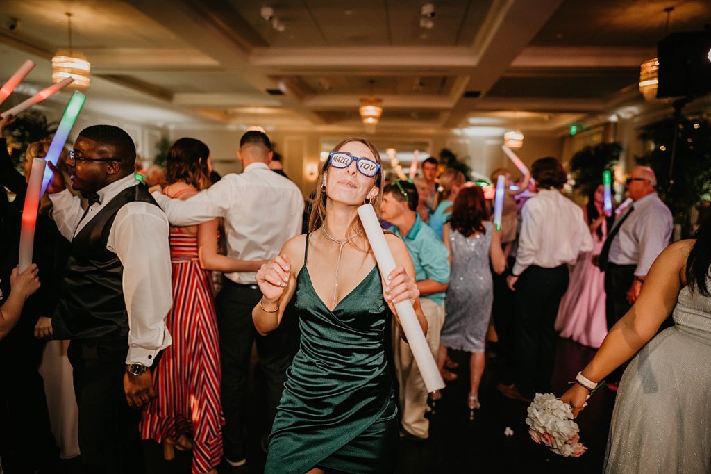 Dancing at the Reception Pelican Club Wedding Photography captured by South Florida Wedding Photographer Krystal Capone Photography
