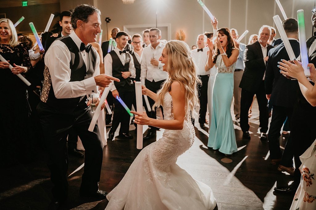 Fun at Reception Pelican Club Wedding Photography captured by South Florida Wedding Photographer Krystal Capone Photography