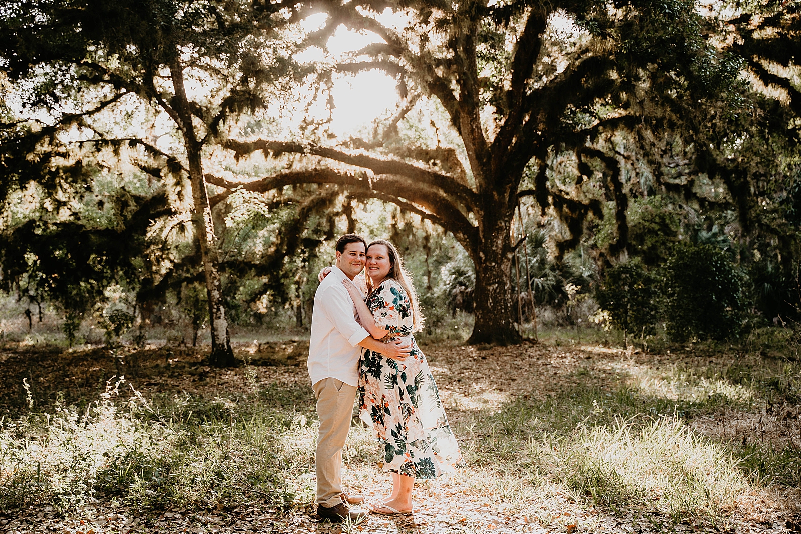 Couple holding each other looking at the camera Riverbend Park Engagement Photography captured by South Florida Engagement Photographer Krystal Capone Photography 