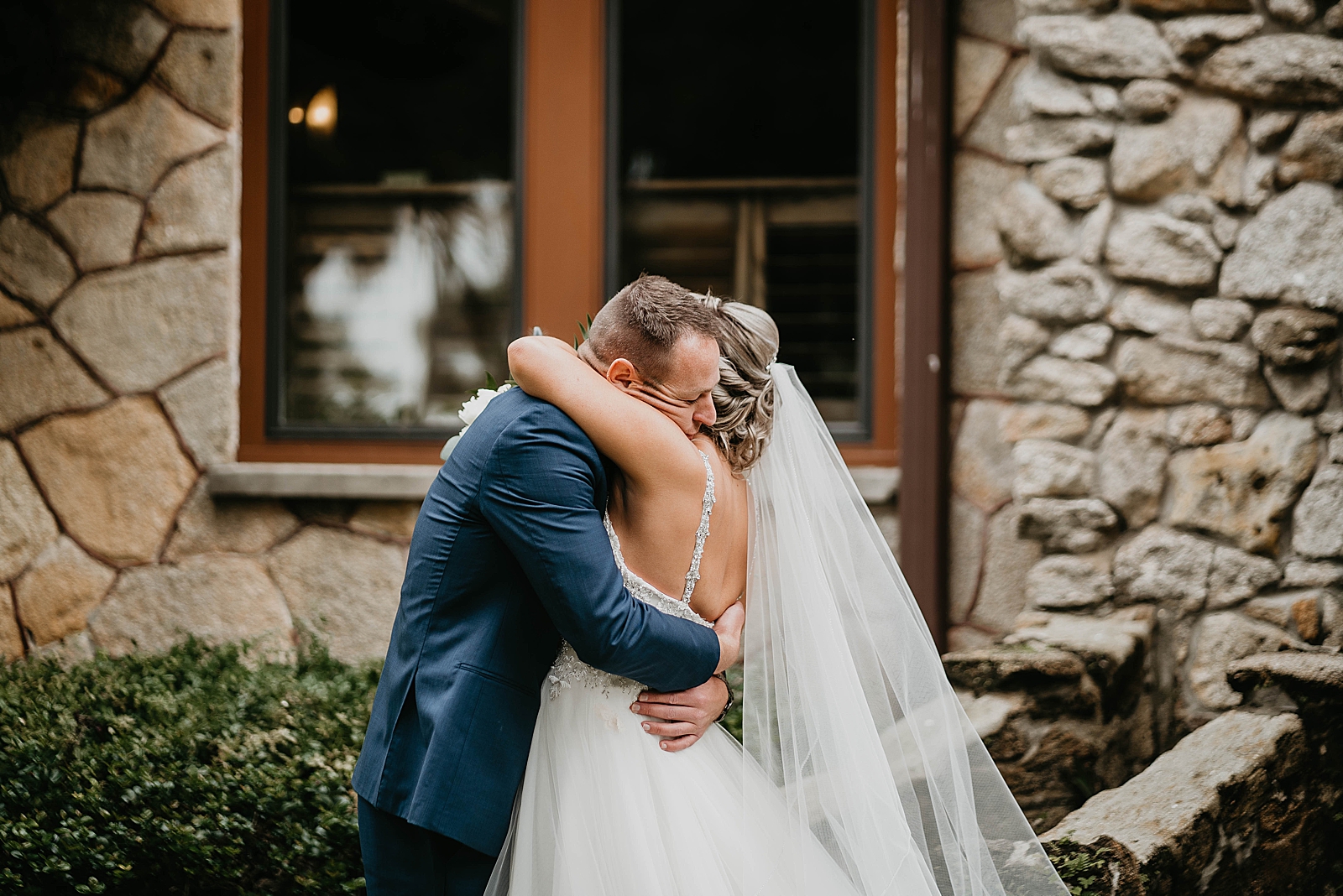 Bride and Groom hugging after first look