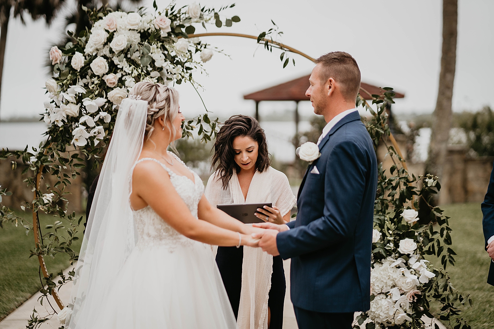 Bride and Groom listening to officiant