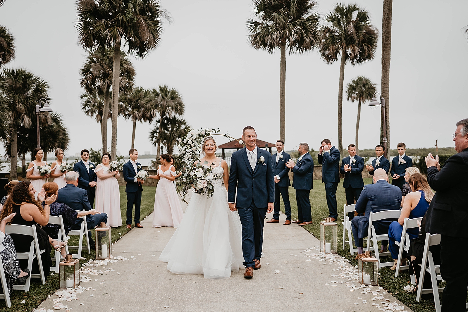 Bride and Groom holding hands and exiting Ceremony together