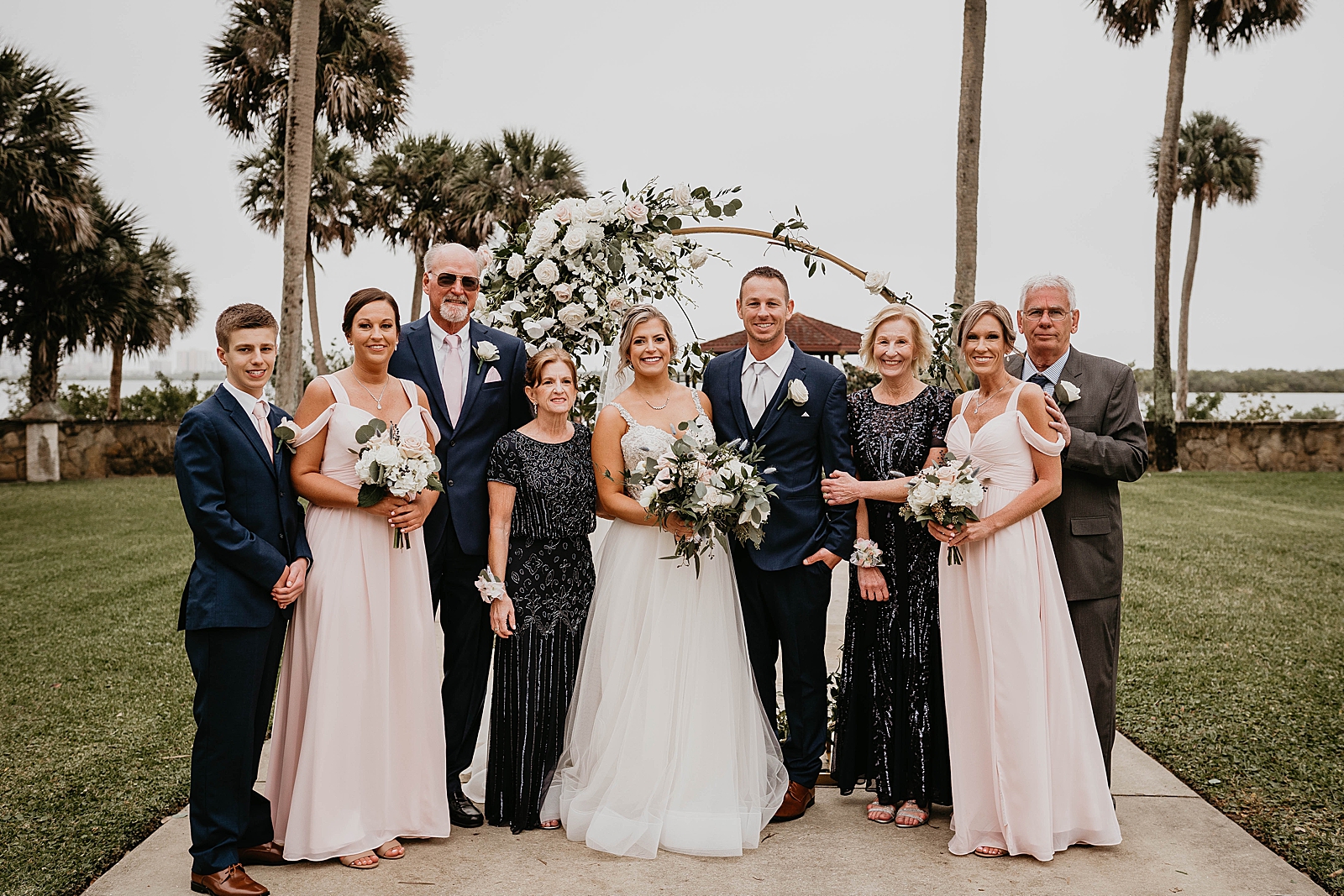 Bride and Groom with family portrait