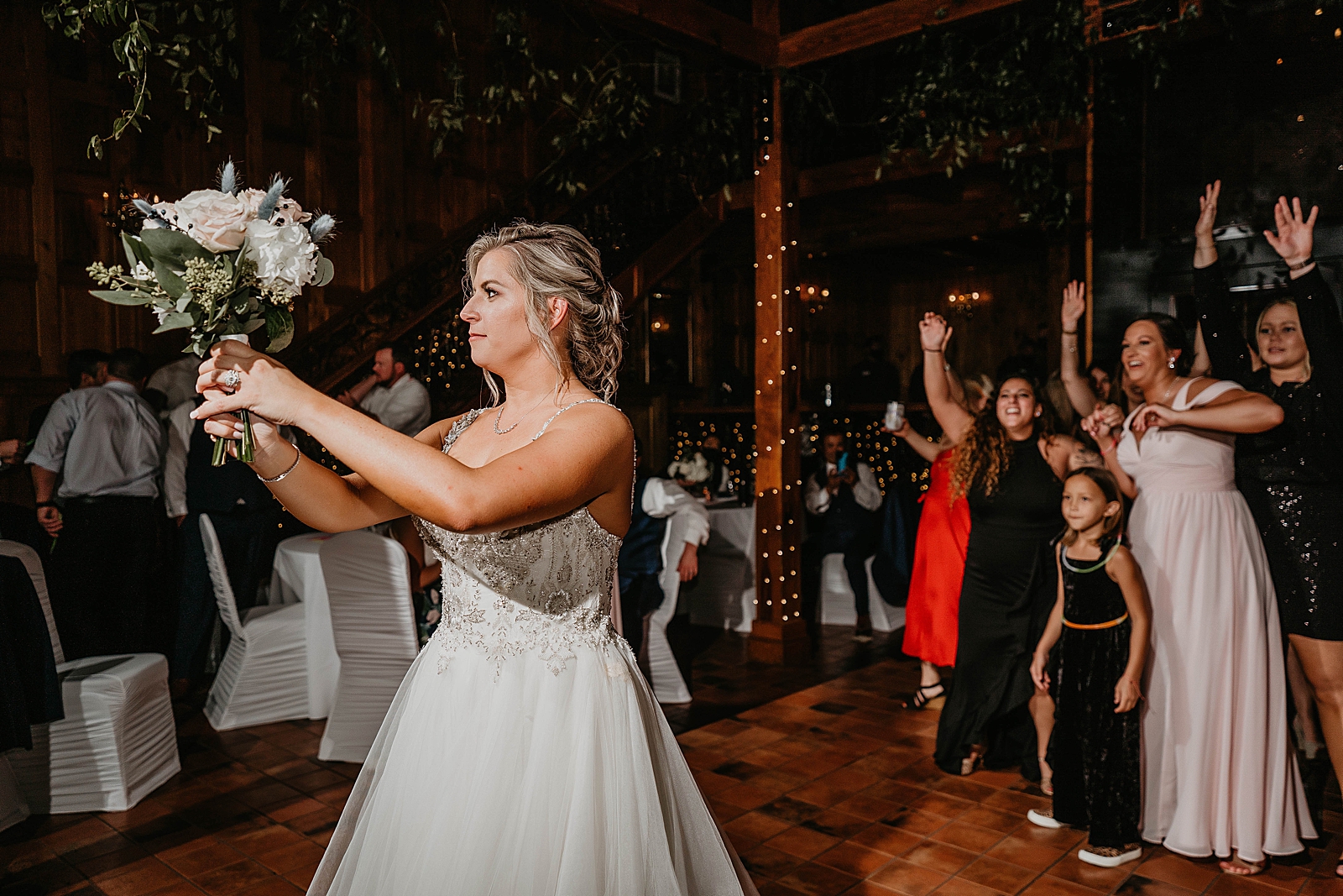 Bouquet toss at Reception