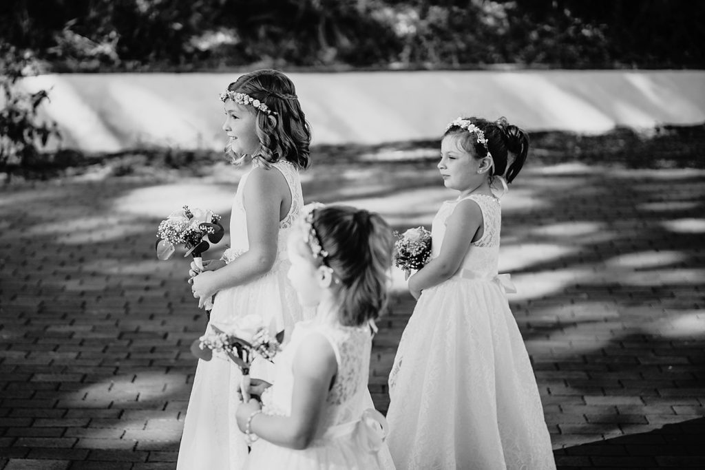 B&W of flower girls entering Ceremony