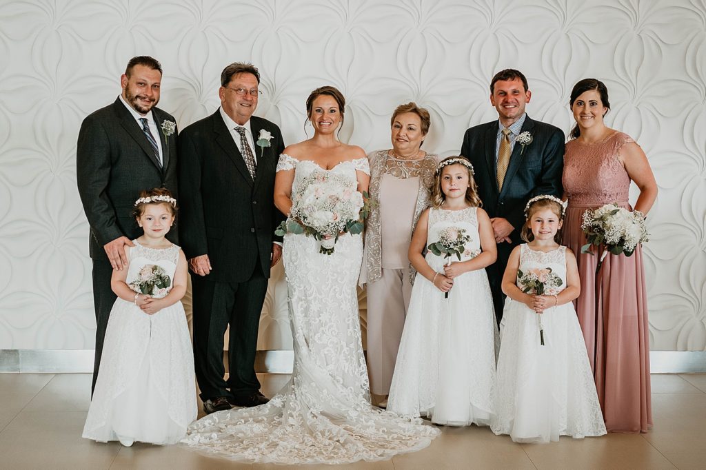 Bride with family portrait