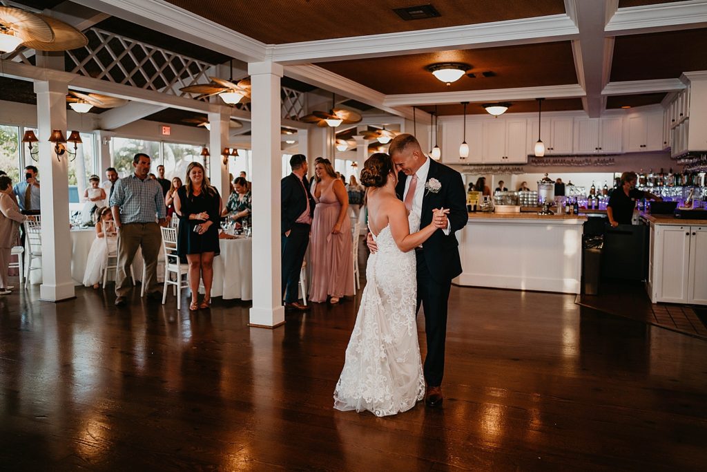 Bride and Groom nuzzling during First Dance