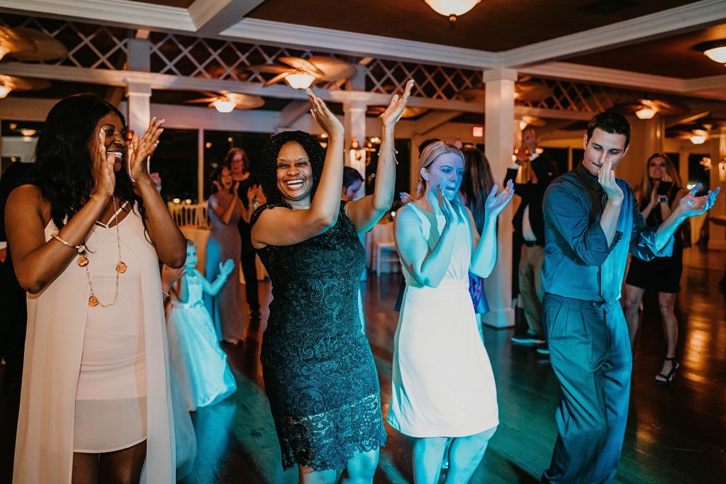 Guests clapping at Reception