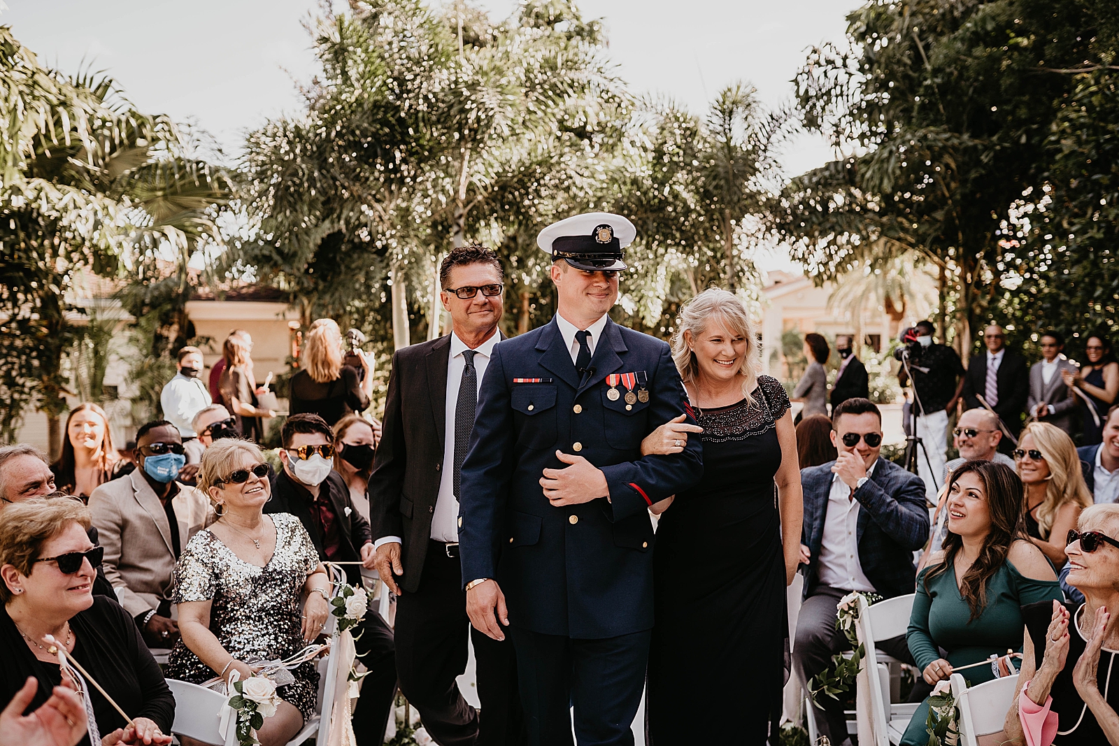 Groom entering Ceremony with Mother and Father